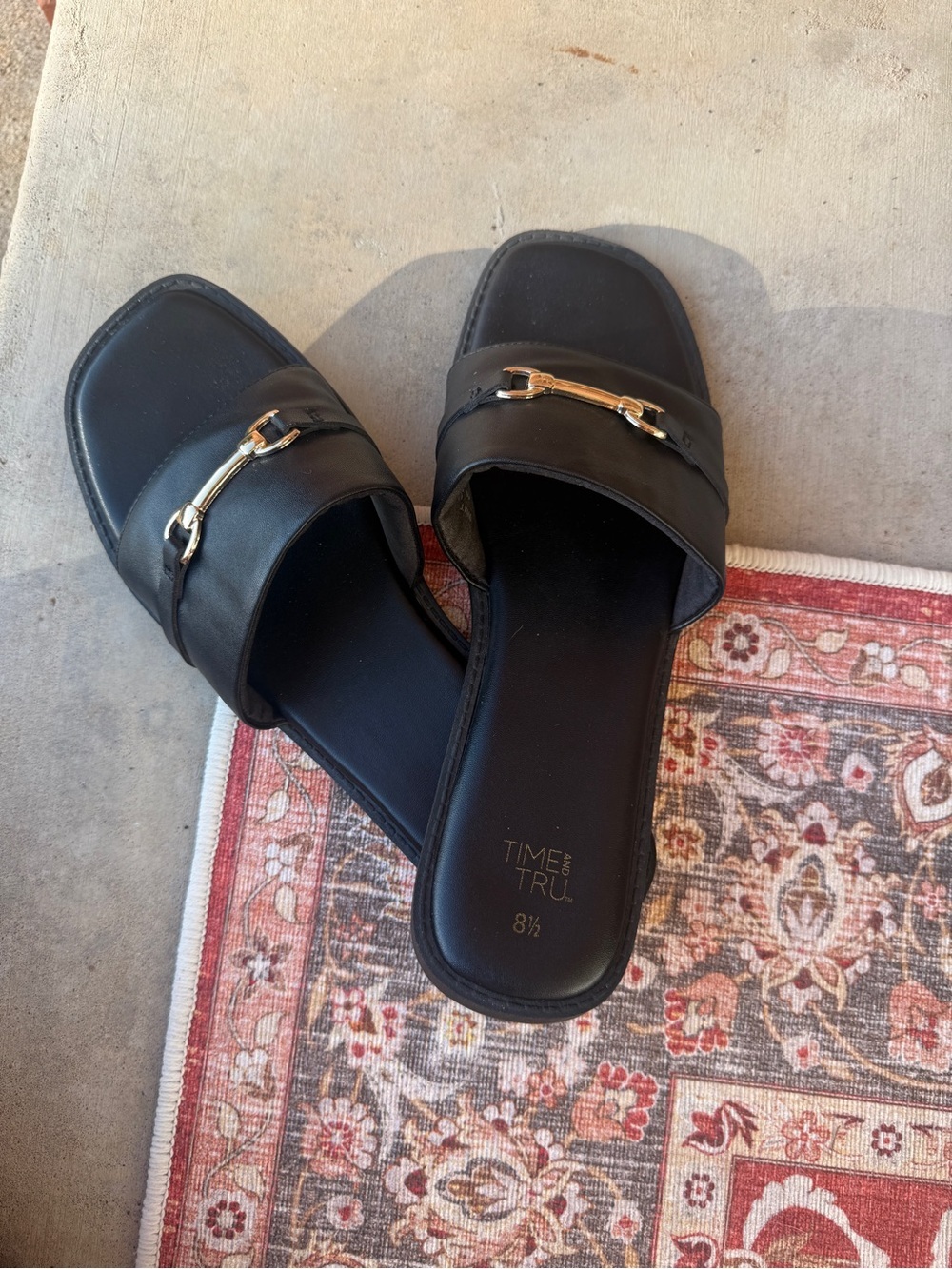 Time and Tru Black Slip-On Sandals with Gold Logo